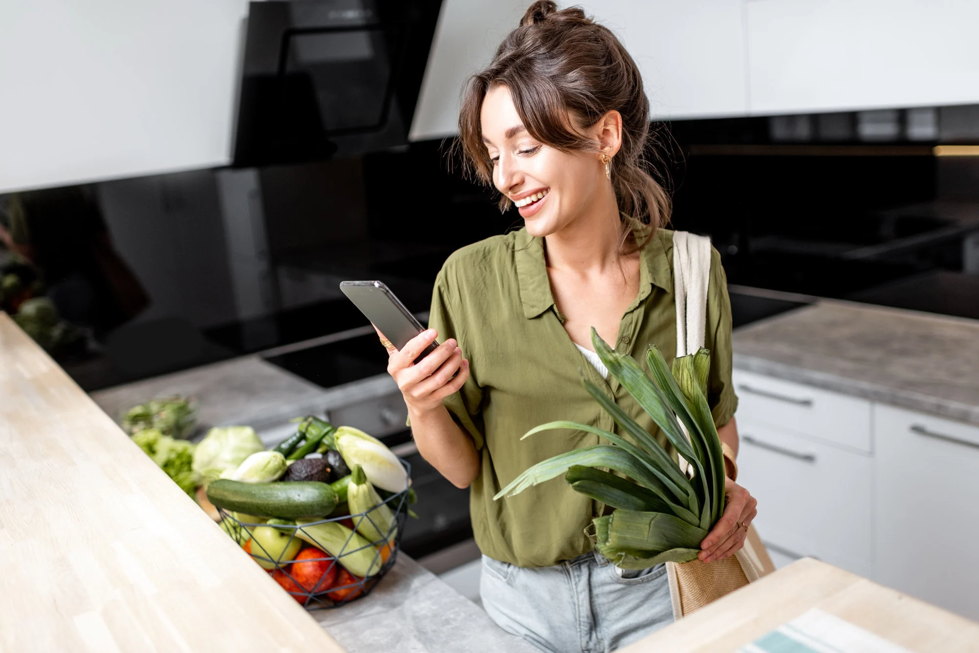 woman-with-fresh-groceries-on-the-kitchen-at-home.jpg